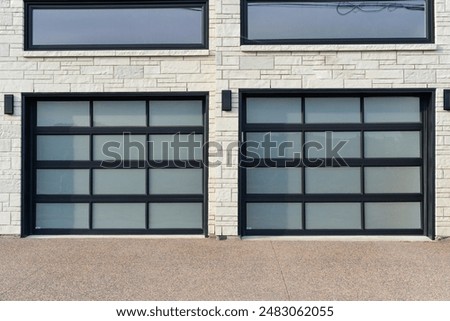 Similar – Image, Stock Photo 2 garages in front of a house wall