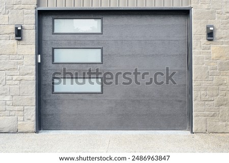 Similar – Image, Stock Photo Three garages in a residential area, one of them is open