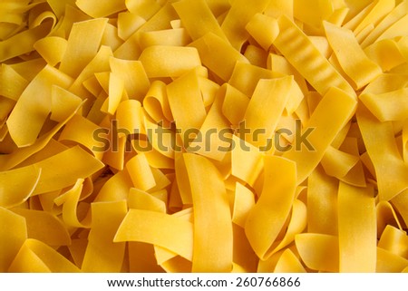 Egg pasta Pappardelle close up background