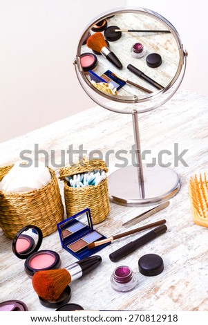 Putting on make up before going out