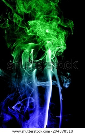 Abstract colorful smoke on black background, smoke background,colorful ink background,Blue and Green smoke, beautiful smoke
