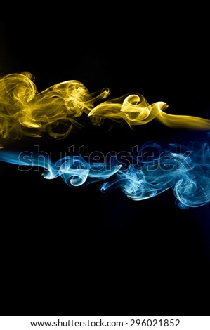 abstract blue and gold smoke on black background, smoke background ,blue and gold smoke background, blue and gold ink ,blue fire