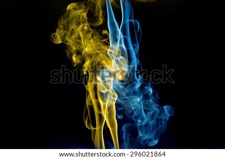 abstract blue and gold smoke on black background, smoke background ,blue and gold smoke background, blue and gold ink ,blue fire