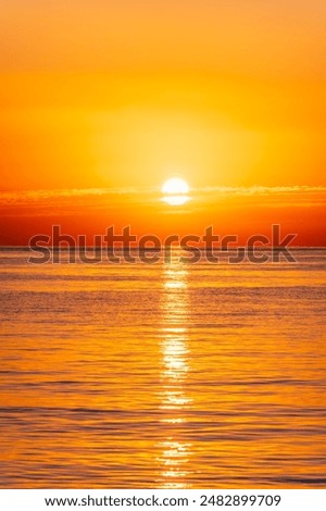 Similar – Image, Stock Photo Scenic sunset over sea and snowy mountains