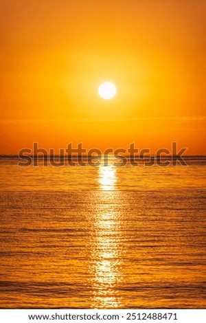 Similar – Image, Stock Photo Scenic sunset over sea and snowy mountains