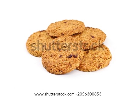 Cereal cookies with red berry fruits on white background. Foto d'archivio © 