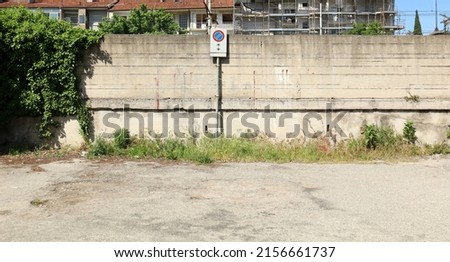 Similar – Foto Bild alte verlassene Asphaltstraße mit verunstalteten Fahrbahnmarkierungen