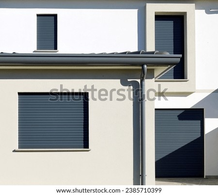 Similar – Image, Stock Photo Windows with modern shutters creating light and shadows at the afternoon light