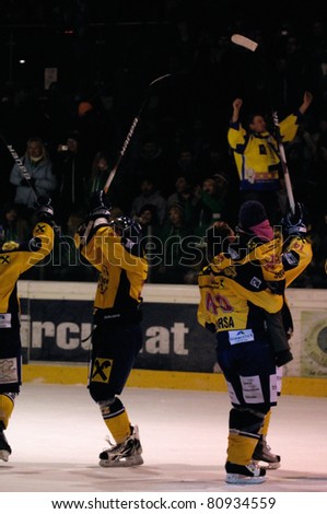 ZELL AM SEE, AUSTRIA - FEB 22: Austrian National League. Zell am see players cheering after game. Game EK Zell am See vs. VEU Feldkirch (Result 3-1) on February 22, 2011 at hockey rink of Zell am See