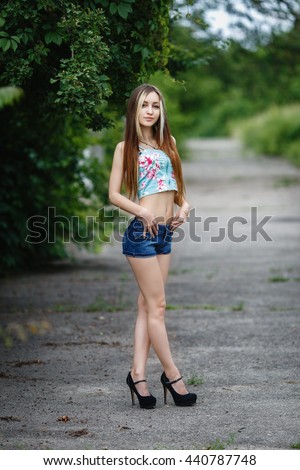 https://image.shutterstock.com/display_pic_with_logo/1712470/440787748/stock-photo-beautiful-young-girl-in-a-sexy-short-dress-440787748.jpg