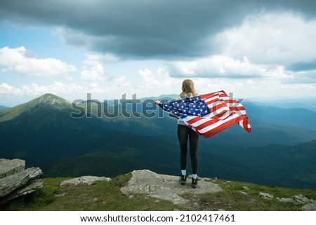 Similar – Image, Stock Photo American woman with flag sitting on road