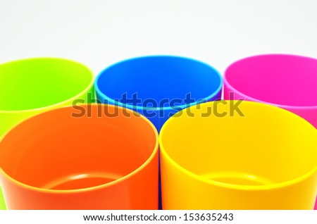 Assorted color plastic drinking cups.