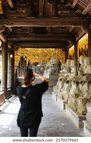 Similar – Image, Stock Photo Bai Dinh Tower Pagoda at the end of the winding road between the trees. . The biggest temple complex in Vietnam. Trang An, Nim Binh.