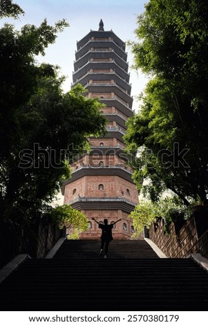 Similar – Image, Stock Photo Bai Dinh Tower Pagoda at the end of the winding road between the trees. . The biggest temple complex in Vietnam. Trang An, Nim Binh.