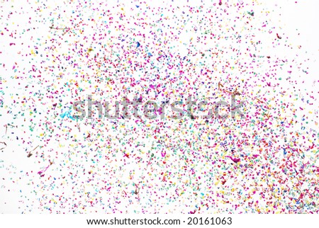 The colorful confetti flying in the sky in a celebration ceremony.