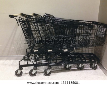 Black cart for shopping Stacked together Photo stock © 