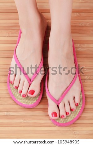 Female Feet With Flip-Flops Stock Photo 105948905 : Shutterstock