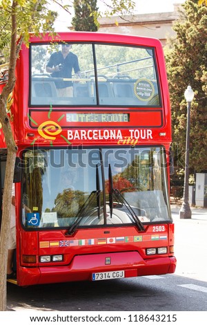 BARCELONA, SPAIN - SEPTEMBER 15: Tourist bus in Barcelona, Spain on September 15, 2011. Barcelona City Tour is a new official touristic bus service that shows the city with an audio guide.