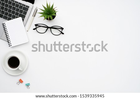 Similar – Image, Stock Photo Desk with laptop, notebook, pen in foreground