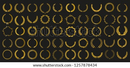 Set of 50 golden vector laurel wreaths on black background. Set of foliate award wreath for cinema festival.Vector illustration. Сток-фото © 