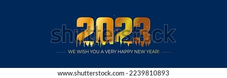 2023 Happy New Year wishing text. Golden 2023 number with City Skyline. Firecrackers sparkle sky and New Year celebration background.