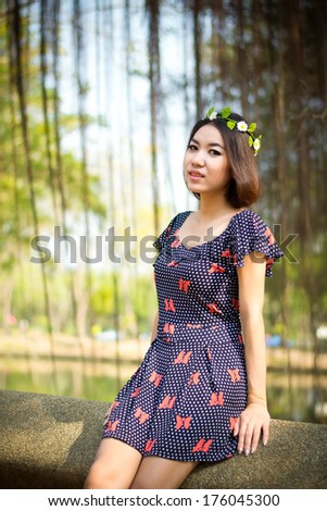 Beautiful asian woman in park