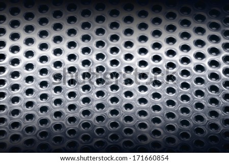 steel structure, metal background, Iron texture with round holes, shiny, metallic surface, sheet of iron with holes, drum of the washing machine, stainless steel