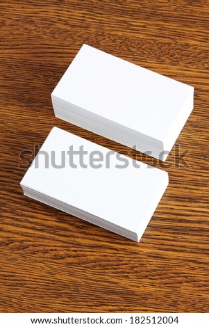 Blanks white business cards on a wooden background, identity design, corporate templates, company style
