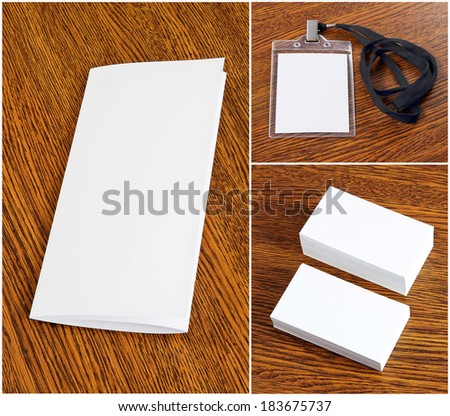 blank white folding paper flyer, badge with neckband, blanks white business cards on a wooden background