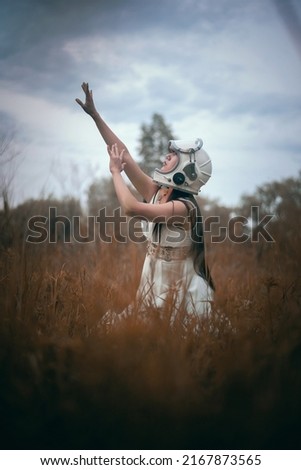 Similar – Image, Stock Photo Asian cosmonaut looking at camera in studio
