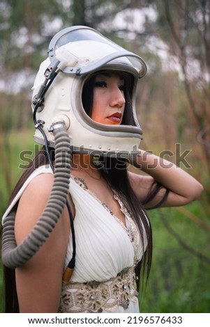 Similar – Image, Stock Photo Asian cosmonaut looking at camera in studio
