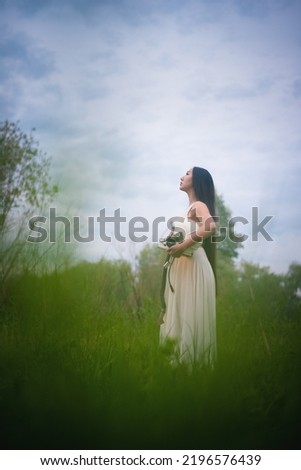 Similar – Image, Stock Photo Asian cosmonaut looking at camera in studio
