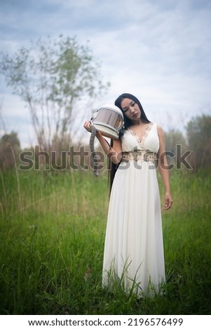 Similar – Image, Stock Photo Asian cosmonaut looking at camera in studio