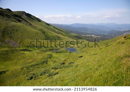 Similar – Image, Stock Photo 1600 | Mountain lake with clouds hanging low in the mountain