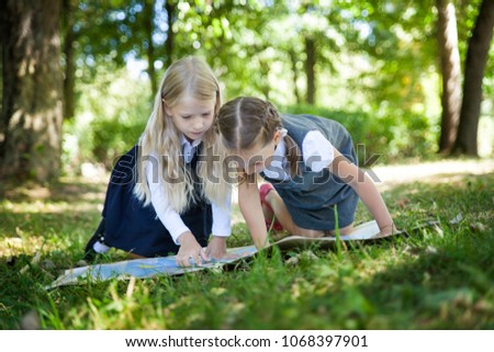 Similar – Image, Stock Photo girl in uniform with sickle in her hand and indicated cutting of the neck