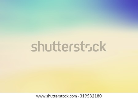 Abstract blurred textured background: yellow orange and blue patterns. Blurred nature background. Beautiful oceans and bright sun light. Summer Holidays, World Environment, Earth Day concept