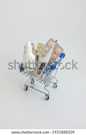 Download Idigitalstock Royalty Free Stock Images And Videos Various Pills And Medical Supplies In A Supermarket Trolley On A White Background Mockup