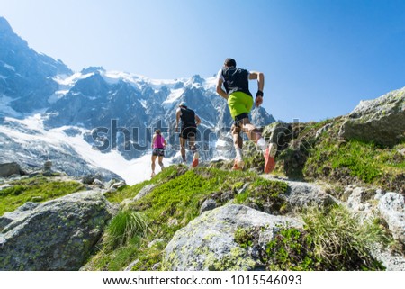 Similar – Image, Stock Photo Man running along path at seaside