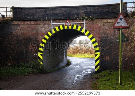 Similar – Foto Bild Unter einer Eisenbahnbrücke.