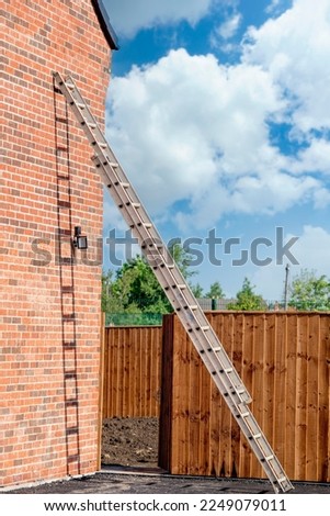 Similar – Image, Stock Photo A ladder leaning against a tree for pruning, under a blue sky with clouds of sheep