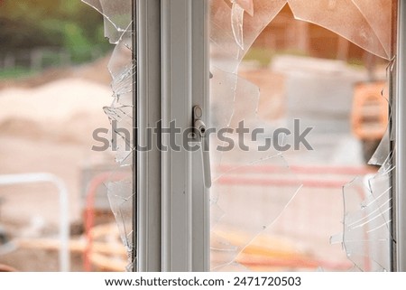 Similar – Image, Stock Photo The broken window in the facade was closed with boards and tarpaulin