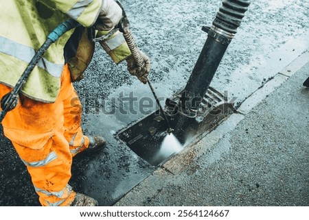 Similar – Image, Stock Photo Road worker cleaning city street with high pressure power washer, cleaning dirty public transport stops, Moscow, Russia