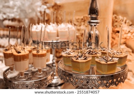 Image, Stock Photo Candy bar on wedding ceremony with a lot of different cupcakes, modern desserts, mousses and jellies. selective focus