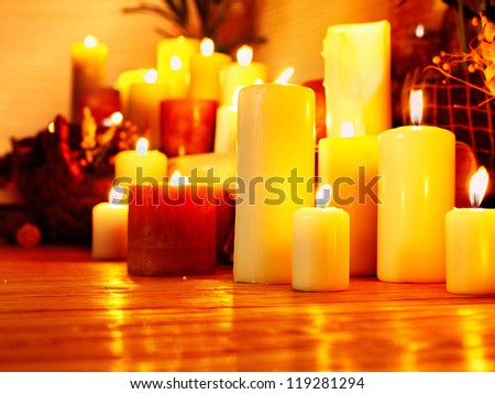 Group burning candle in luxury spa salon.