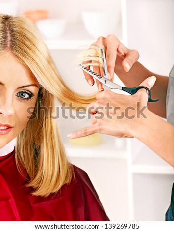 Woman in hairdressing salon do hair style.