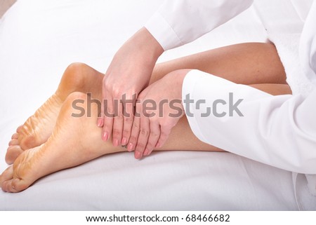 Massage of female leg. Health and beauty.
