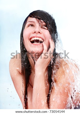 Beautiful young woman take shower.