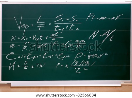 School blackboard with chalk writing.