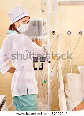 Hospital female doctor with iv drip.