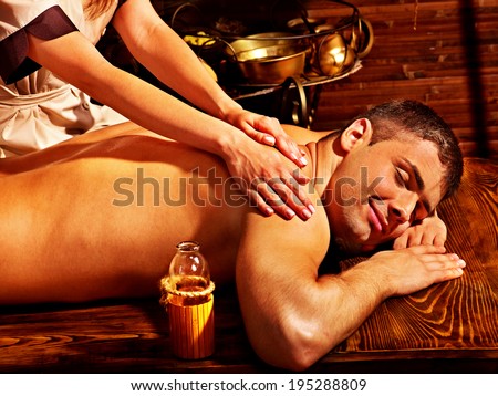 Man  having oil Ayurveda spa treatment.